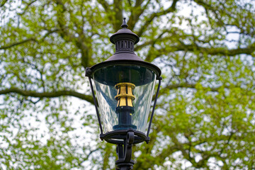 Close-up of black lantern at public park at Swiss City of Winterthur on a cloudy spring day. Photo taken May 17th, 2023, Winterthur, Switzerland.