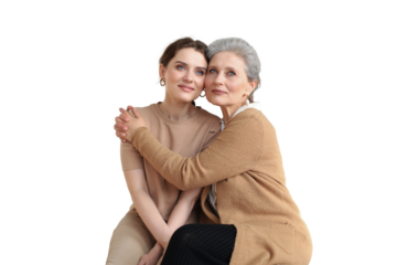 Cheerful young woman is embracing her middle aged mother with closed eyes hugging, touching cheeks, sitting on a transparent background. Happy trusted relations. Family concept.