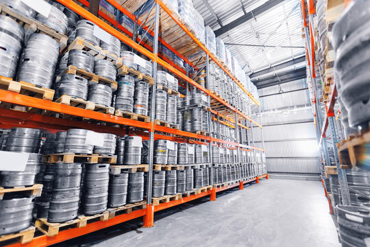 Beer kegs in warehouse of modern brewery stock
