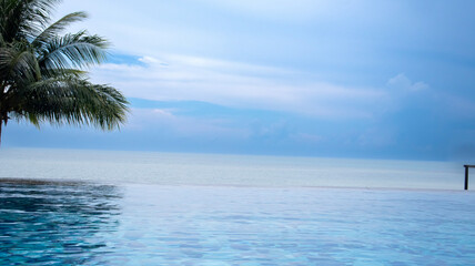 Beautiful infinity swimingpool with ocean view.coconut trees, calm blue skies, perfect for clearing your mind on vacation - Belitung Indonesia