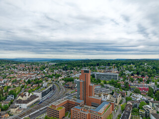 Aerial view of Swiss City of Winterthur with buildings, streets and scenic landscape on a cloudy spring morning. Photo taken May 17th, 2023, Winterthur, Switzerland.