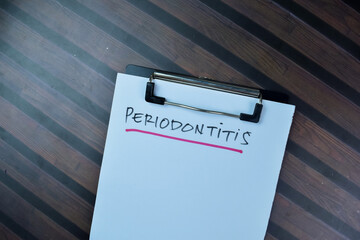Concept of Periodontitis write on paperwork isolated on Wooden Table.