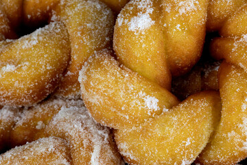 A Pile of Freshly Made Sugar Donuts Closeup View