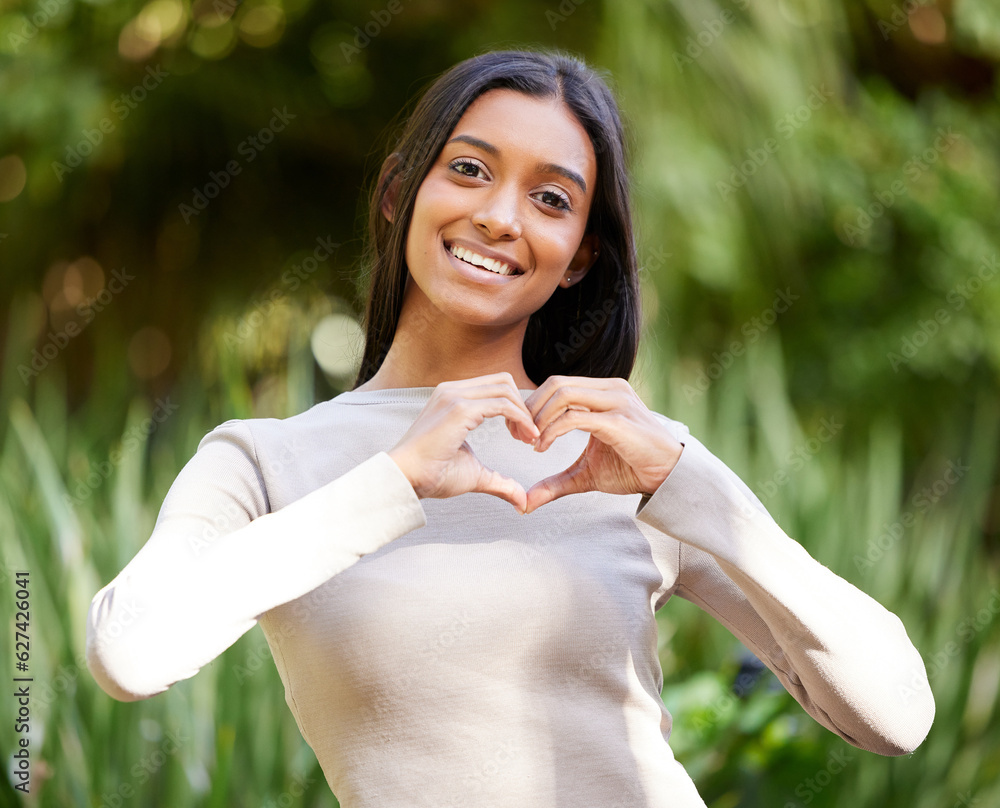 Sticker Portrait, smile and woman with heart hands in nature for love, care and affection. Face, love hand gesture and Indian female person with emoji for kindness, empathy or romance, support and trust.