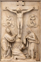 Fototapeta na wymiar NAPLES, ITALY - APRIL 19, 2023: The marble relief of Crucifixion in the church Chiesa di Sant Anna dei Lombardi by Giulio Mazzoni (1518 - 1590).