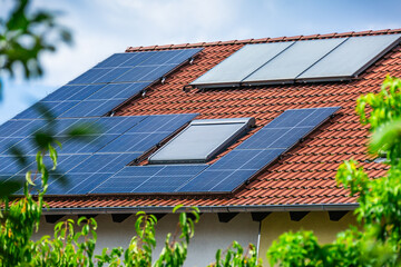 Photovoltaic panels on the roof of family house, solar panels.