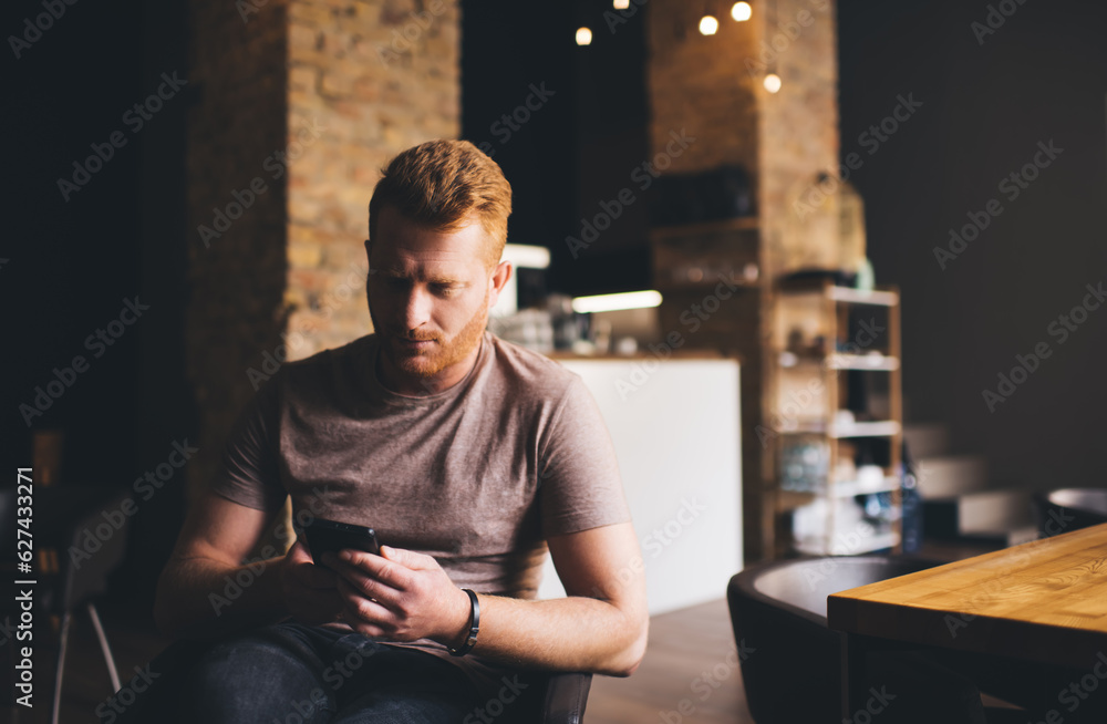 Poster caucasian male using cellphone application for online chatting and messaging in social media network