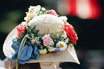 Female hat decorated with flowers on a midsummer nordic festival 