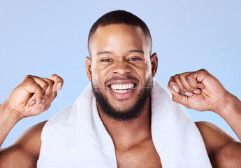 Portrait, man and floss teeth for smile, dental health and care for gum gingivitis in studio. Face of happy black male model, oral thread and cleaning mouth for fresh breath, tooth hygiene and beauty - obrazy, fototapety, plakaty