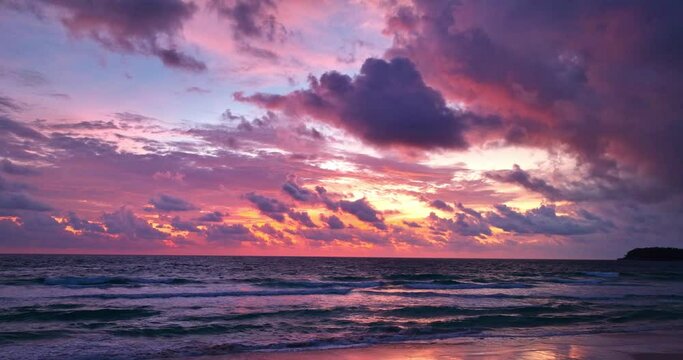 .aerial view amazing the colorful purple clouds shifted shapes in the breeze..Majestic sunset or sunrise landscape Amazing light of nature cloudscape sky and Clouds moving away rolling.
