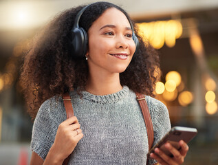 .City, headphones and woman with cellphone, smile and connection with happiness, mobile app and...