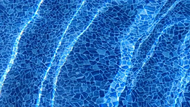 Clear Blue Turquoise Water Surface Shimmering in Sun on Sunny Day, Slow Motion. Water in  Pool. Beautiful Blue Background of Water.
