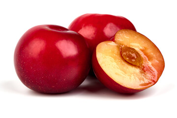 Fresh juicy plums, isolated on white background.