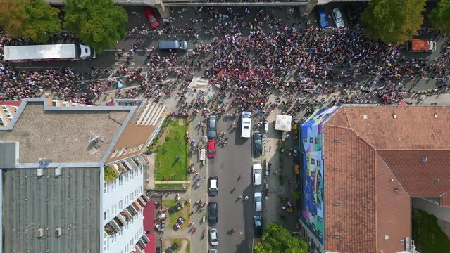 Amazing aerial top view flight drone. CSD Pride Love Parade 2023 in city Berlin