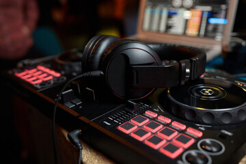 music console and headphones for DJ. DJ console cd mp4 deejay mixing desk music party in nightclub....