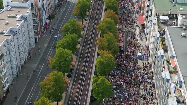 Stunning aerial top view flight drone. CSD Pride Love Parade 2023 in city Berlin