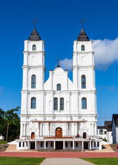 Fototapeta premium Beautiful white Chatolic Church in Latvia ,Aglona, nice blue sky and white clouds