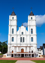 Fototapeta na wymiar Beautiful white Chatolic Church in Latvia ,Aglona, nice blue sky and white clouds