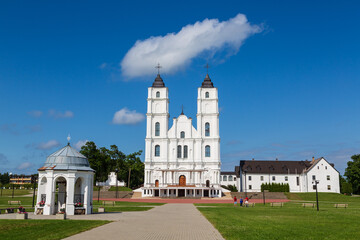 Fototapeta na wymiar Beautiful white Chatolic Church in Latvia ,Aglona, nice blue sky and white clouds