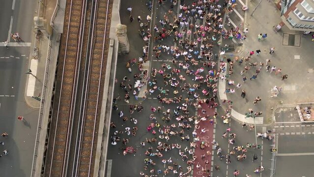Gorgeous aerial top view flight drone. CSD Pride Love Parade 2023 in city Berlin