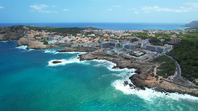 Aerial view of Cala Agulla beach in Mallorca, Spain, on a hot summer day