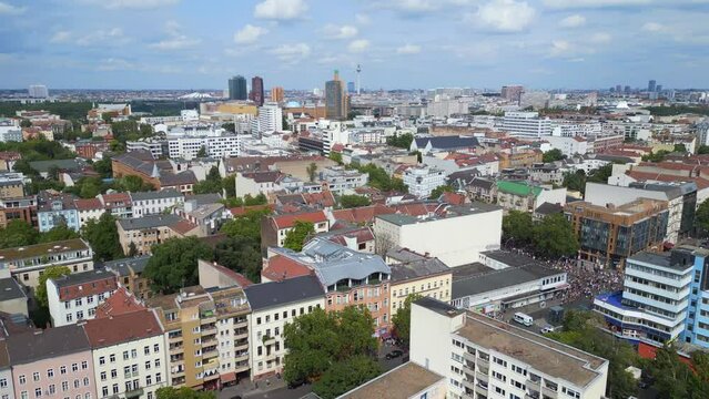 Dramatic aerial top view flight drone. CSD Pride Love Parade 2023 in city Berlin