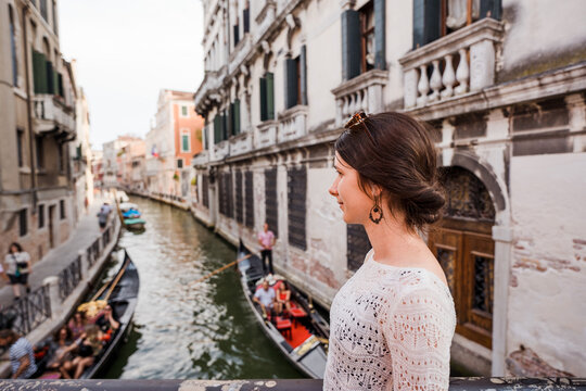 Fototapeta Beautiful female model on the streets of Venice, Italy