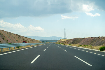 Fototapeta premium Empty toll highway. Otoyol 33 or North Aegean Motorway (Kuzey Ege Otoyolu) and abbreviated as the O-33 is a 55.2 km long toll motorway in western Turkey.