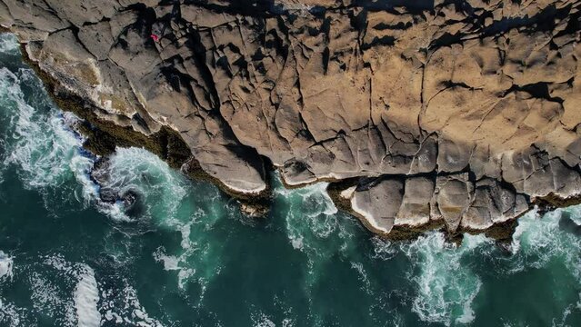 Waves Crashing against the Cliffs along the Oregon Coast. Angry Seas. Drone Aerial View. Video 005