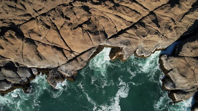 Waves Crashing against the Cliffs along the Oregon Coast. Angry Seas. Drone Aerial View. Video 006