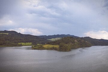 Dunajec River surrounded by green forest and hills