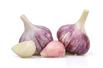 Heads and cloves of garlic isolated on white background.