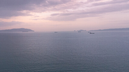 Aerial photos of the coast of Lechería, Anzoátegui State, los canals beach. Photos of the horizon over the sea, palya, oil tankers, sky, nbes, sunset