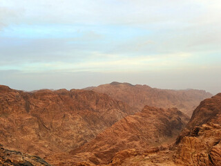 Sinai desert panorama. Egypt mountains and sunset from the top of Mount Sinai. desert landscapes. Christian pilgrimages.