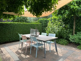 Appeltern, Netherlands, July 11, 2023: Appeltern adventure garden. Beautiful summer terrace with...
