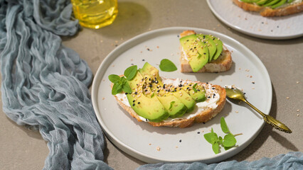 Toast with avocado cream cheese and wheat bread