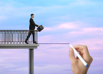 Support or partnership concept. Man drawing bridge to help businessman walk forward