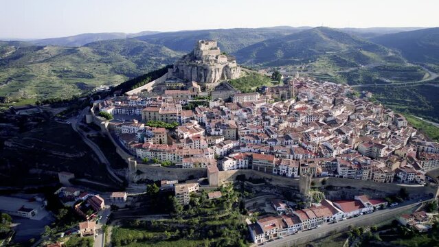 Aerial general view of the walled village of Morella and its castle on top of the rock, Spain