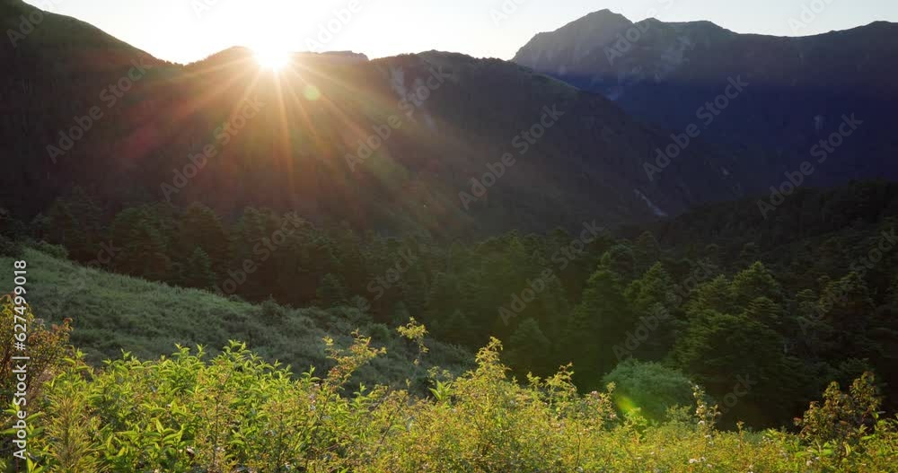 Sticker sunlight flare over the mountain in hehuanshan of taiwan