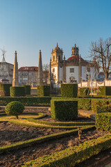 Fototapeta premium View at the Church Bom Jesus da Cruz with fountain in Barcelos. The town symbol is a rooster in Portuguese called Galo de Barcelos (Rooster of Barcelos).