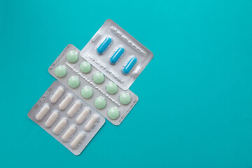 Mental health food supplements and vitamins. Pills top view with copy space.