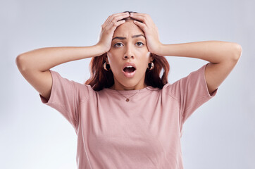 Mistake, wow and young woman in studio with hand on head for anxiety, stress or panic. Portrait of a shocked female model person on a white background with gossip, bad news and problem or fail