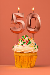 Birthday cake with candle number 50 - Coral fusion background