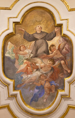 NAPLES, ITALY - APRIL 20, 2023: The fresco of Apotheosis of St. Anthony of Padua in the church Chiesa di Santa Caterina a Chiaia by unknown artist of 18. cent.