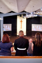 veteran standing in uniform in church at a service memorial day veteran's day