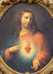 NAPLES, ITALY - APRIL 20, 2023: The painting of Heart of Jesus in the church Chiesa di San Ferdinando by unknown artist.
