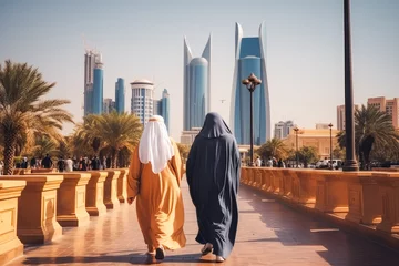 Fototapete Autobahn in der Nacht Riyadh travel destination. Two tourists walking through city. Tour tourism exploring.