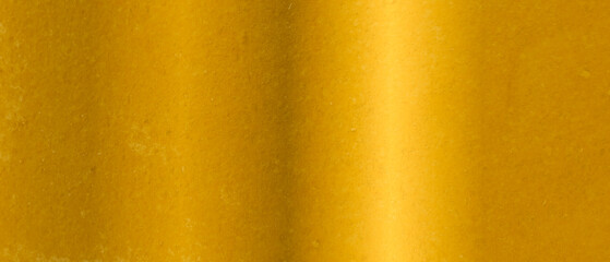 Shiny gold surface as background, closeup view