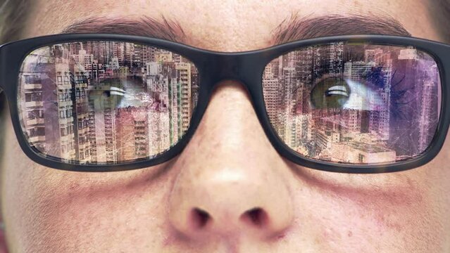 Woman, double exposure glasses and city reflection of a person looking at urban and cityscape data. Eyes, glass and closeup with architecture and digital biometric tech vision with a female architect