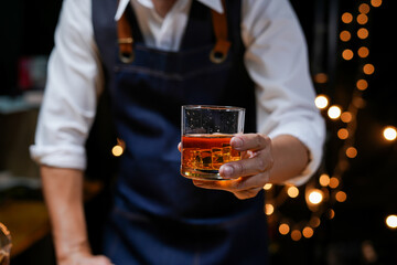 Bartender Serve Whiskey, on wood bar, 